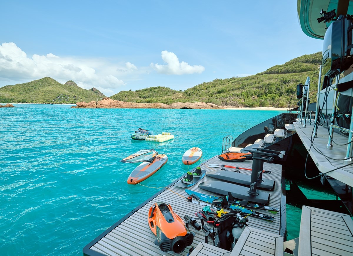 Watersports equipment laid out on the swim platform of the Sunreef 80