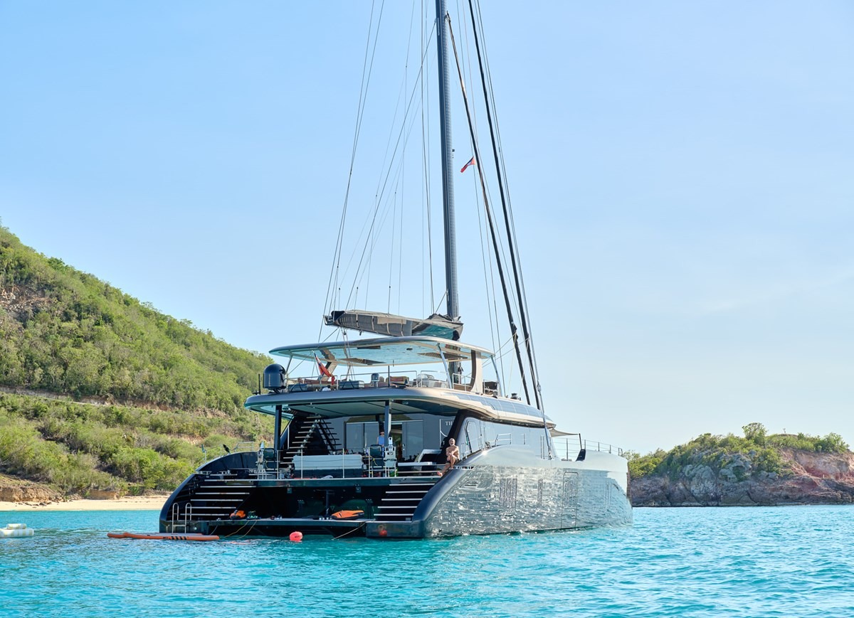 Sunreef 80 catamaran at anchor in a turquoise Caribbean bay